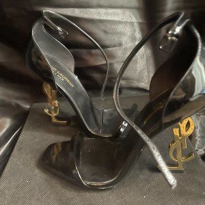 Never worn New YSL black Sandal with gold Heel